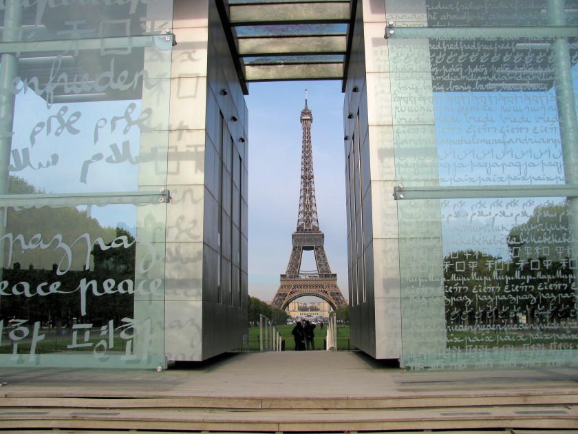 La Tour Eiffel through the Peace Monument in Champ-de-Mars Park