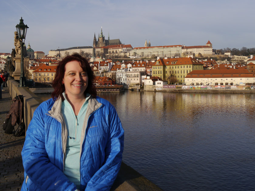 Becky on Charles Bridge with Prague Castle in Background