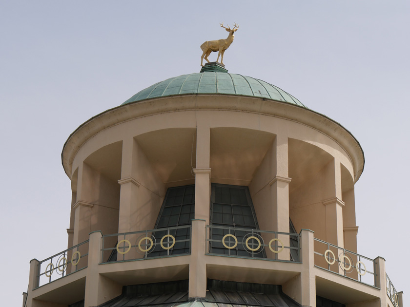 Golden Deer Statue on Palace of Arts Dome at Schlossplatz