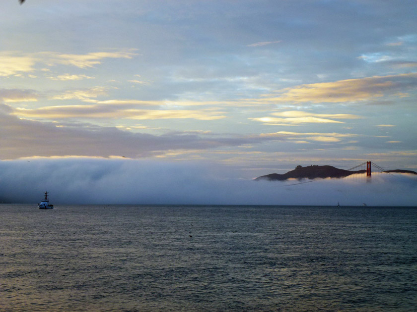 Fog Covering the Golden Gate Bridge at Sunset